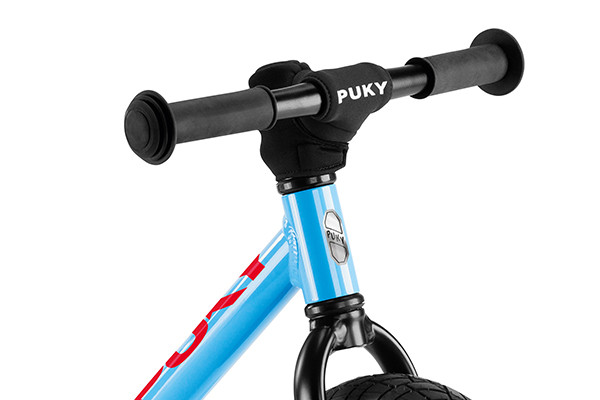 Compleet met zwarte Puky kinbeschermer.